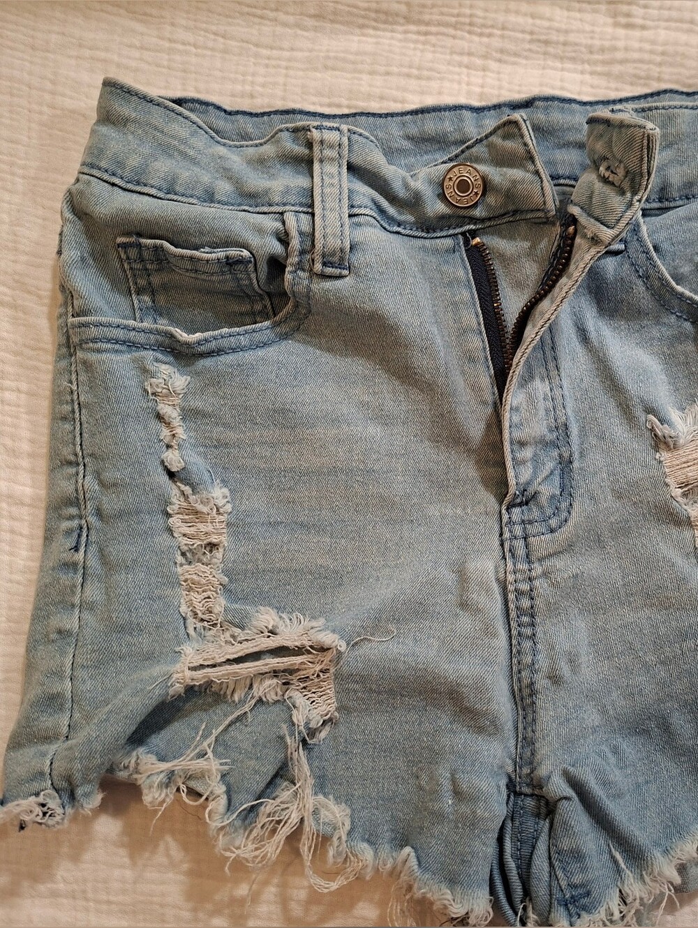Light Blue Distressed Women’s Denim Shorts